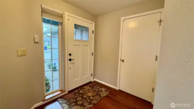 Entry is a welcoming area to greet your quests...and the perfect place for your guests to leave any personal items they don't want to bring into the home...shoes, umbrellas, etc!