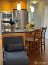 Granite countertops grace the island and countertops!