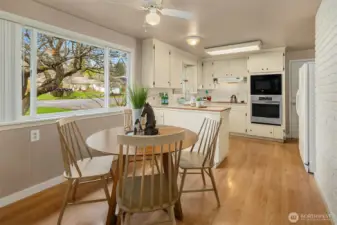Spacious kitchen with large eating space.