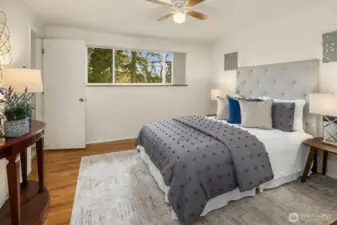 Primary suite. Hardwood floors on main level.