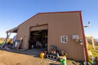 Exterior view of the 810 sqft attached shop with convenient access.