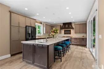 The kitchen quartz island fit for large gatherings
