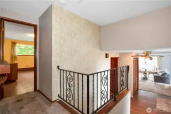 The original rod iron railings adds to the retro feel of this home.