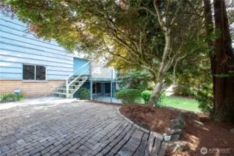 The side yard has several levels and provides a green space to enjoy.