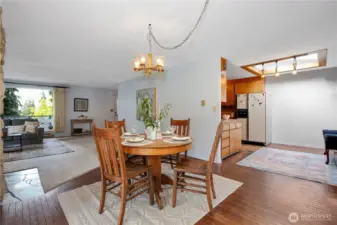 The dining room has room for a large table and many guests. The kitchen has room for an additional table should you want to have a breakfast nook. This area could also be used to make the kitchen larger if you feel like remodelling.