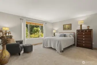 The generously sized primary bedroom offers plenty of space to unwind—your own private retreat at the end of the day.