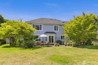 Outside, enjoy the serenity of a 15,885 sq ft lot—private, quiet, and surrounded by lush greenery.