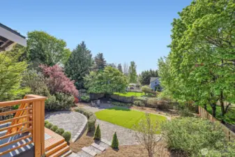 Enormous fully-fenced backyard. Beautiful and low maintenance!