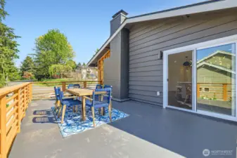 Right off the kitchen, imagine relaxing with family and friends on your rooftop deck.