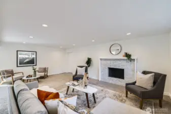 Downstairs has a wet bar, two bedrooms and access to the backyard.