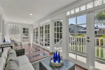 Large sunroom overlooks backyard