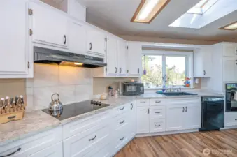 Modern kitchen designed for function and style with stainless-steel appliances.