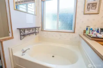 Relax in the spacious soaking tub—your private retreat after a long day.