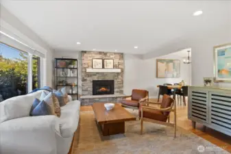 The living room offers a cozy gas fireplace with a recently updated facade and mantel.