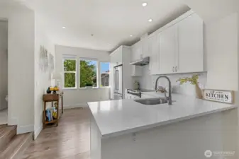 Tall west-facing windows make this unit bright and welcoming.