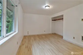 Primary suite - lots of light with newly updated bathroom.