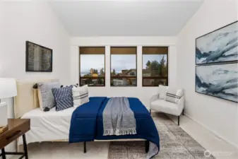 This little bedroom next to the primary bedroom on the 2nd floor makes a great little study room, home office, or kids room. It has a lovely view of the Sound and Olympic mountains.
