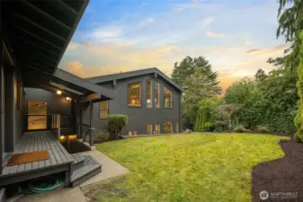 This lovely covered deck is right off the family room at the same level as the kitchen. Enjoy a large secluded lawn with privacy hedges and fencing, very easily maintained. Separate sprinkler systems keep the front and back lawns fresh.