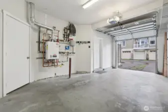 Large garage completely painted and ready for your vehicle!  EV Charger too.