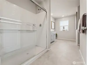 Finally a primary bathroom with large shower and space to move around. Photos are representative