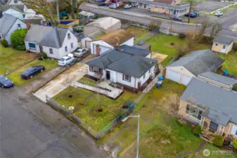 Aerial view of the lot showing the large backyard - separated into one garden section and one yard section.