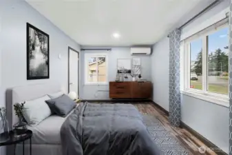 Virtually staged main floor bedroom.