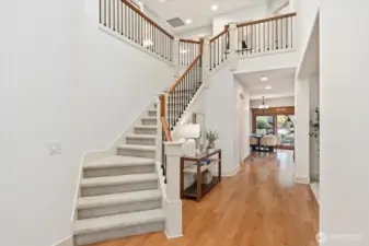A soaring two-story entry sets an elegant first impression. Fresh new interior paint and plush carpet throughout too!