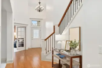 Impeccable Burnstead craftsmanship surrounds you...from the expansive staircase to the gleaming hardwood floors