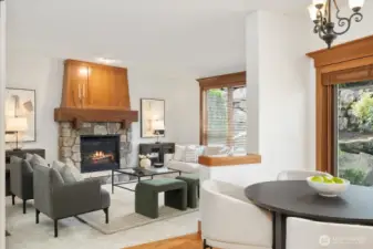 Sunny eating nook opens to an inviting, entertaining patio, creating desirable indoor-outdoor living! Large sliding doors allow for the beautifully landscaped yard to be a serene back drop for the living spaces.