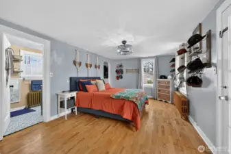 Primary bedroom with primary bathroom & walk-in-closet.