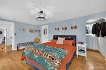 Walk in closet in foreground.