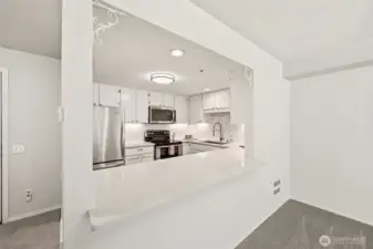 Bright, functional layout with breakfast bar & under-cabinet lighting