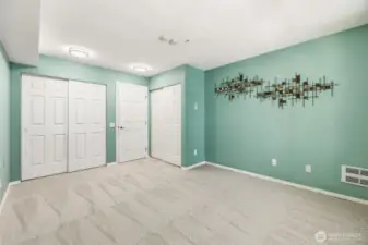 Comfortable primary suite with thoughtfully designed closets