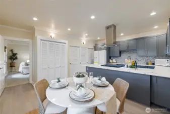 This is the beautiful kitchen with eating area downstairs. Plenty of storage and counter space and a gas stove & cook top.