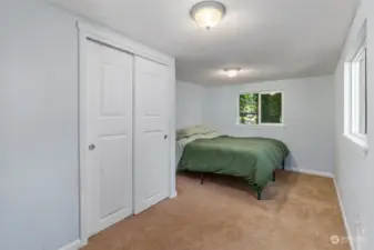 Generous sized bedroom with extra deep closet.
