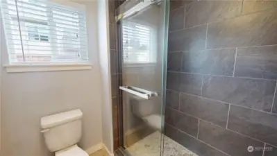 Primary ensuite shower & privy room