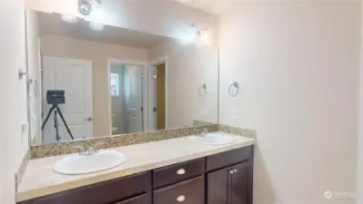 Primary ensuite bath w/double vanity and lots of cabinet space!