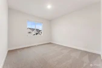Photo is of a similar home