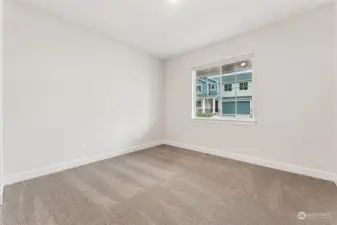 Photo is of a similar home