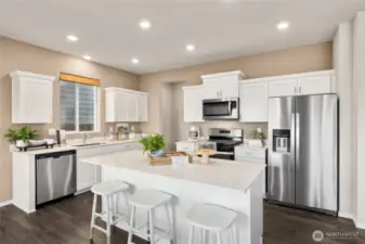 Kitchen. Photos are of model home of the same plan and may reflect different colors and options.