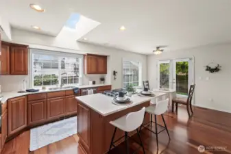 Kitchen with updated cabinets, tile and countertops