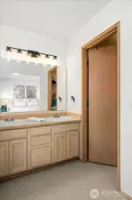 Walk in closet in the primary bedroom.