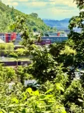 Territorial view out over the railroad tracks. When Mt Rainier is out.. it's yours to savor.