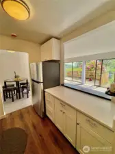 Quartz counters, with nice view through the living area to the private patio.
