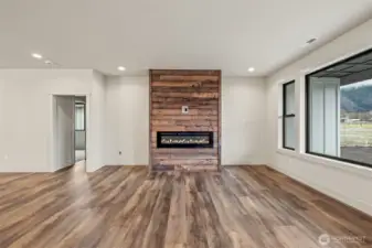 Electric fireplace with reclaimed barn wood accent
