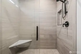 Spacious shower with beautiful finishes