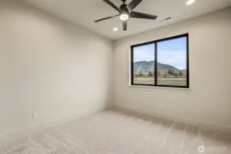 Second bedroom with spacious layout and mountain view