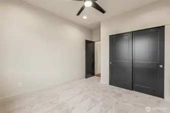 Spacious closets with sliding doors in each of the non-primary bedrooms