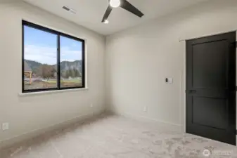 Spacious closets with sliding doors in each of the non-primary bedrooms