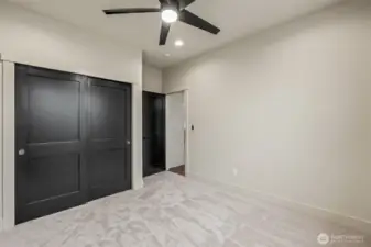 Spacious closets with sliding doors in each of the non-primary bedrooms